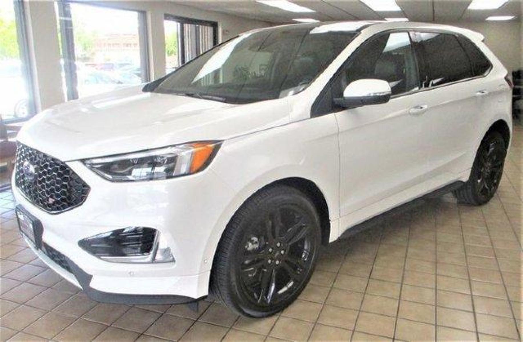 2020 Star White Metallic Tri-Coat Ford Edge (2FMPK4AP1LB) with an 6 2.7 L engine, Automatic transmission, located at 3240 Washington Blvd., Ogden, 84401, (801) 621-7177, 41.204967, -111.969994 - 2020 Ford Edge ST *Price Reduced!!*Sherm's Store Crew is Excited about This One!**This is a Sensational SUV with Polished Body Lines, and Astonishing Performance, at a Truly Agreeable Price Range.**One Owner, Clean Title, with No Accident History.**Come in and Claim this Like New Ford Edge for Your - Photo #0