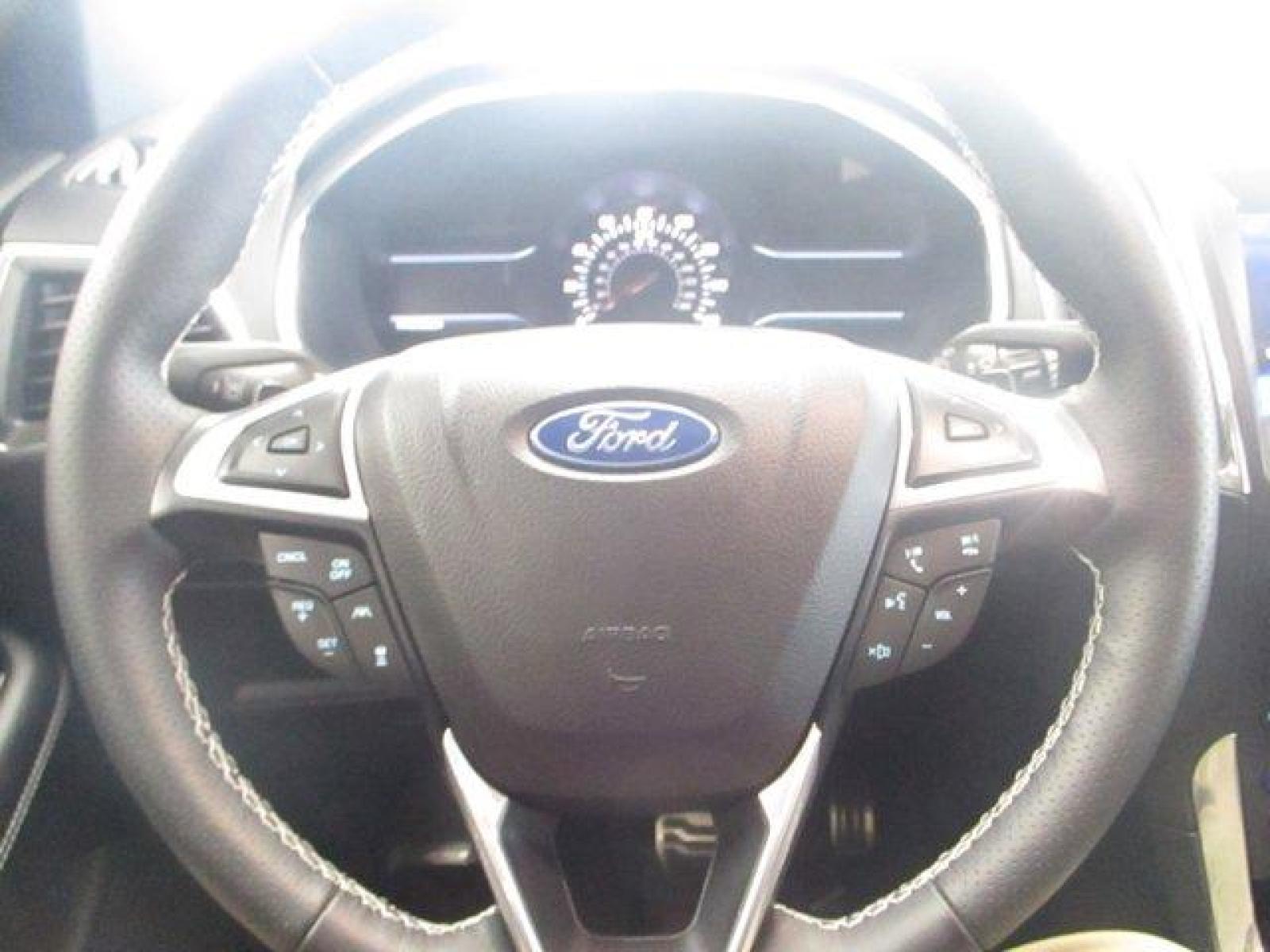 2020 Star White Metallic Tri-Coat Ford Edge (2FMPK4AP1LB) with an 6 2.7 L engine, Automatic transmission, located at 3240 Washington Blvd., Ogden, 84401, (801) 621-7177, 41.204967, -111.969994 - 2020 Ford Edge ST *Price Reduced!!*Sherm's Store Crew is Excited about This One!**This is a Sensational SUV with Polished Body Lines, and Astonishing Performance, at a Truly Agreeable Price Range.**One Owner, Clean Title, with No Accident History.**Come in and Claim this Like New Ford Edge for Your - Photo #18