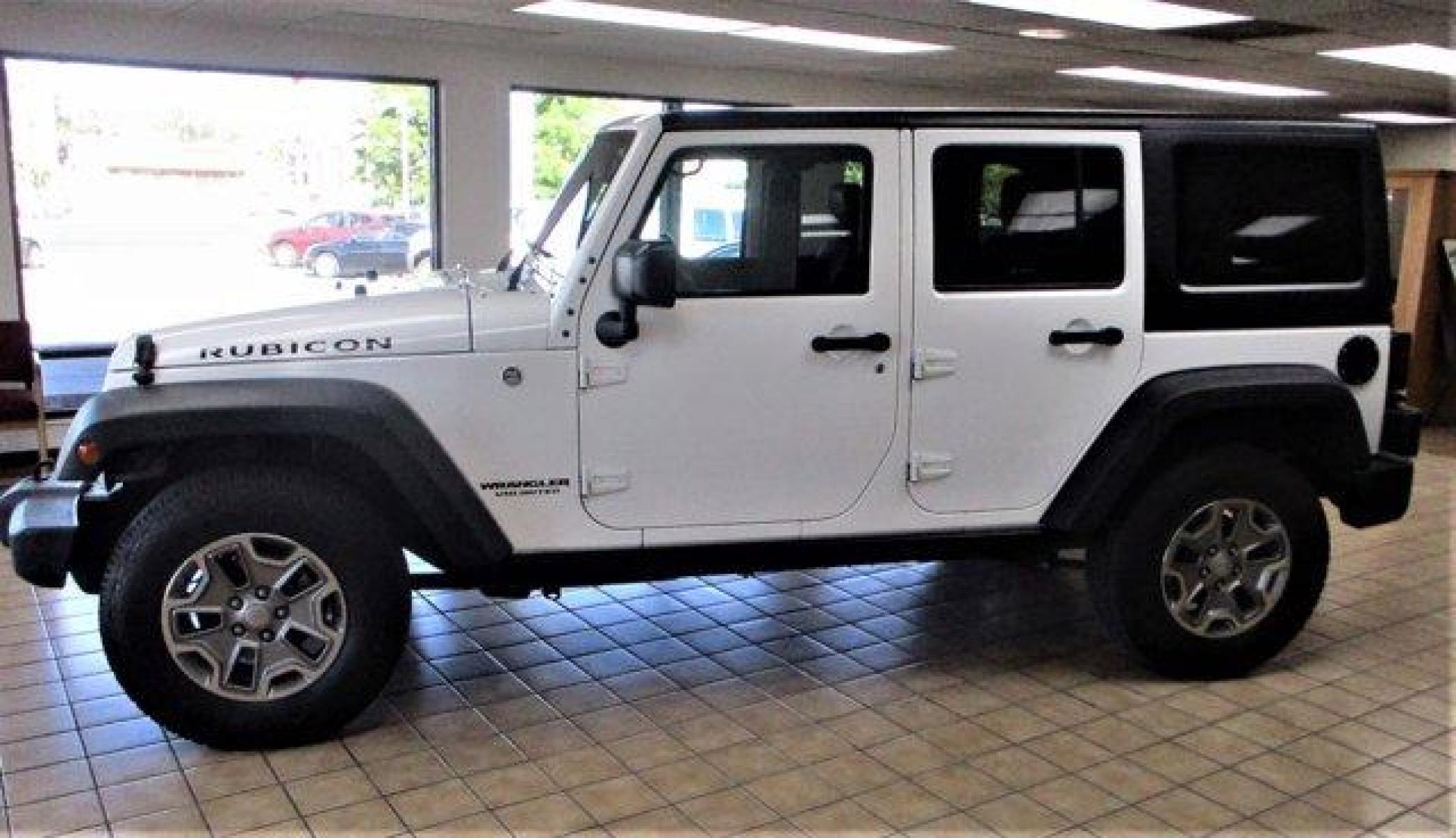 2016 Bright White Clearcoat /Black Jeep Wrangler Unlimited (1C4BJWFGXGL) with an 6 3.6 L engine, Automatic transmission, located at 3240 Washington Blvd., Ogden, 84401, (801) 621-7177, 41.204967, -111.969994 - Photo #1
