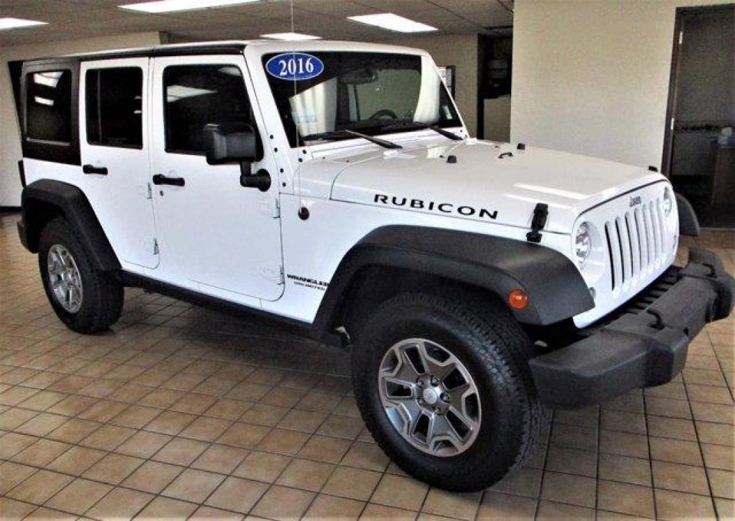 2016 Bright White Clearcoat /Black Jeep Wrangler Unlimited (1C4BJWFGXGL) with an 6 3.6 L engine, Automatic transmission, located at 3240 Washington Blvd., Ogden, 84401, (801) 621-7177, 41.204967, -111.969994 - 2016 Jeep Wrangler Unlimited Rubicon*Sherm's Store is Excited to Offer this Clean Title, **No **Accident **History **Jeep **Rubicon to New, and Repeat Customers.*Including: Heated Leather Upholstery, Exceptional Condition, Well Maintained,Clean Feel and Comfortable Ride!Additional:MOPAR PREMIUM SOUN - Photo #2