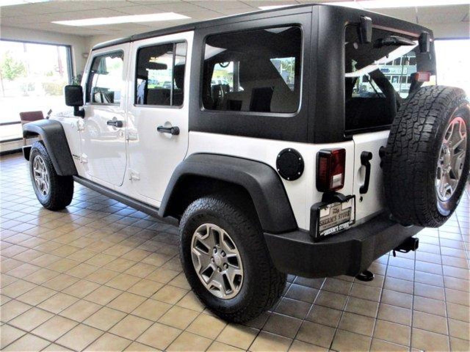 2016 Bright White Clearcoat /Black Jeep Wrangler Unlimited (1C4BJWFGXGL) with an 6 3.6 L engine, Automatic transmission, located at 3240 Washington Blvd., Ogden, 84401, (801) 621-7177, 41.204967, -111.969994 - Photo #6