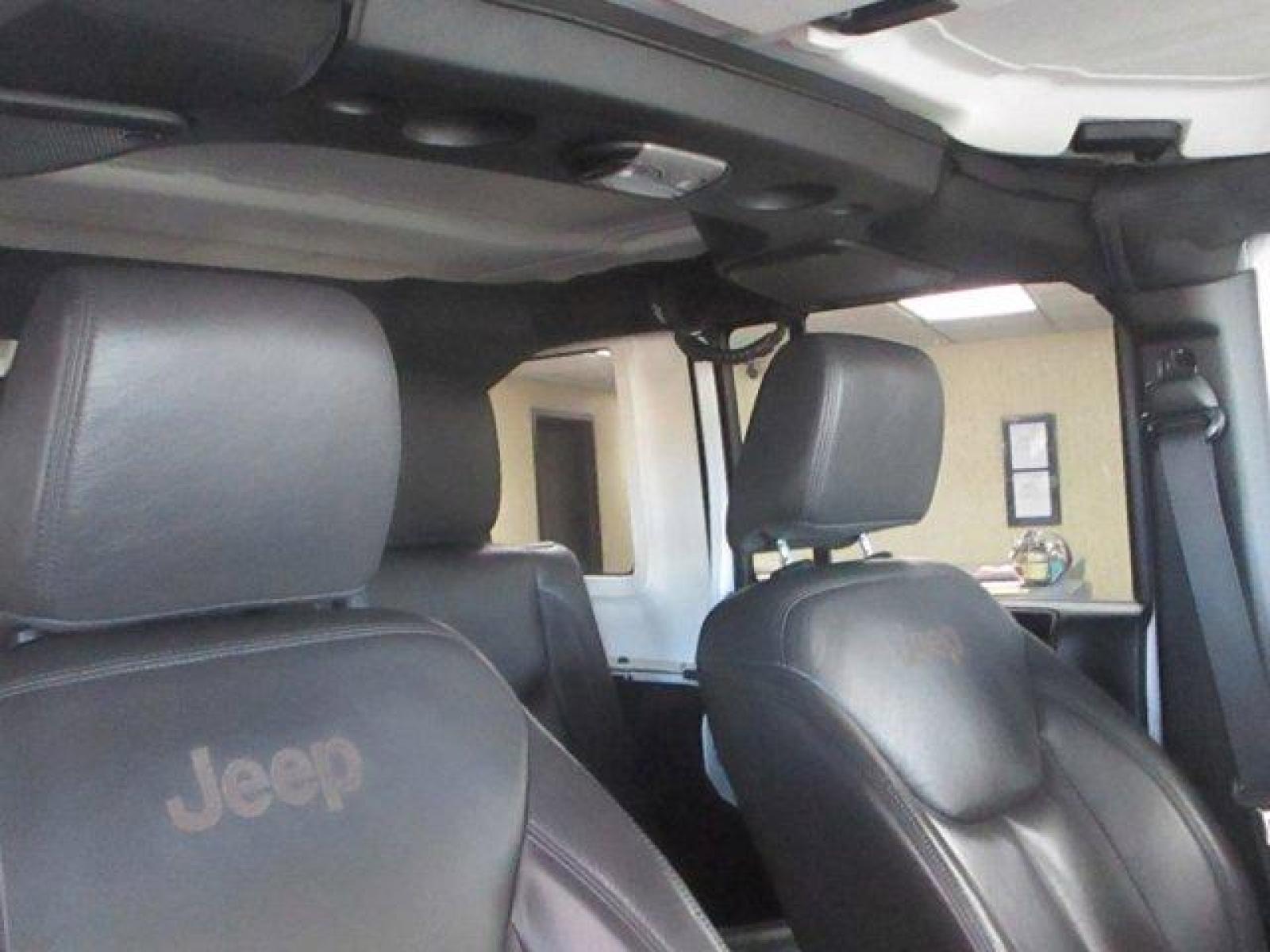 2016 Bright White Clearcoat /Black Jeep Wrangler Unlimited (1C4BJWFGXGL) with an 6 3.6 L engine, Automatic transmission, located at 3240 Washington Blvd., Ogden, 84401, (801) 621-7177, 41.204967, -111.969994 - 2016 Jeep Wrangler Unlimited Rubicon*Sherm's Store is Excited to Offer this Clean Title, **No **Accident **History **Jeep **Rubicon to New, and Repeat Customers.*Including: Heated Leather Upholstery, Exceptional Condition, Well Maintained,Clean Feel and Comfortable Ride!Additional:MOPAR PREMIUM SOUN - Photo #27