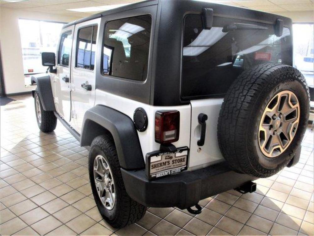 2016 Bright White Clearcoat /Black Jeep Wrangler Unlimited (1C4BJWFGXGL) with an 6 3.6 L engine, Automatic transmission, located at 3240 Washington Blvd., Ogden, 84401, (801) 621-7177, 41.204967, -111.969994 - 2016 Jeep Wrangler Unlimited Rubicon*Sherm's Store is Excited to Offer this Clean Title, **No **Accident **History **Jeep **Rubicon to New, and Repeat Customers.**Let's Put this Fantastic Jeep in Your **Driveway.**Stop in or Call Today and Claim This Today!**Performing With:*MOPAR PREMIUM SOUND and - Photo #6