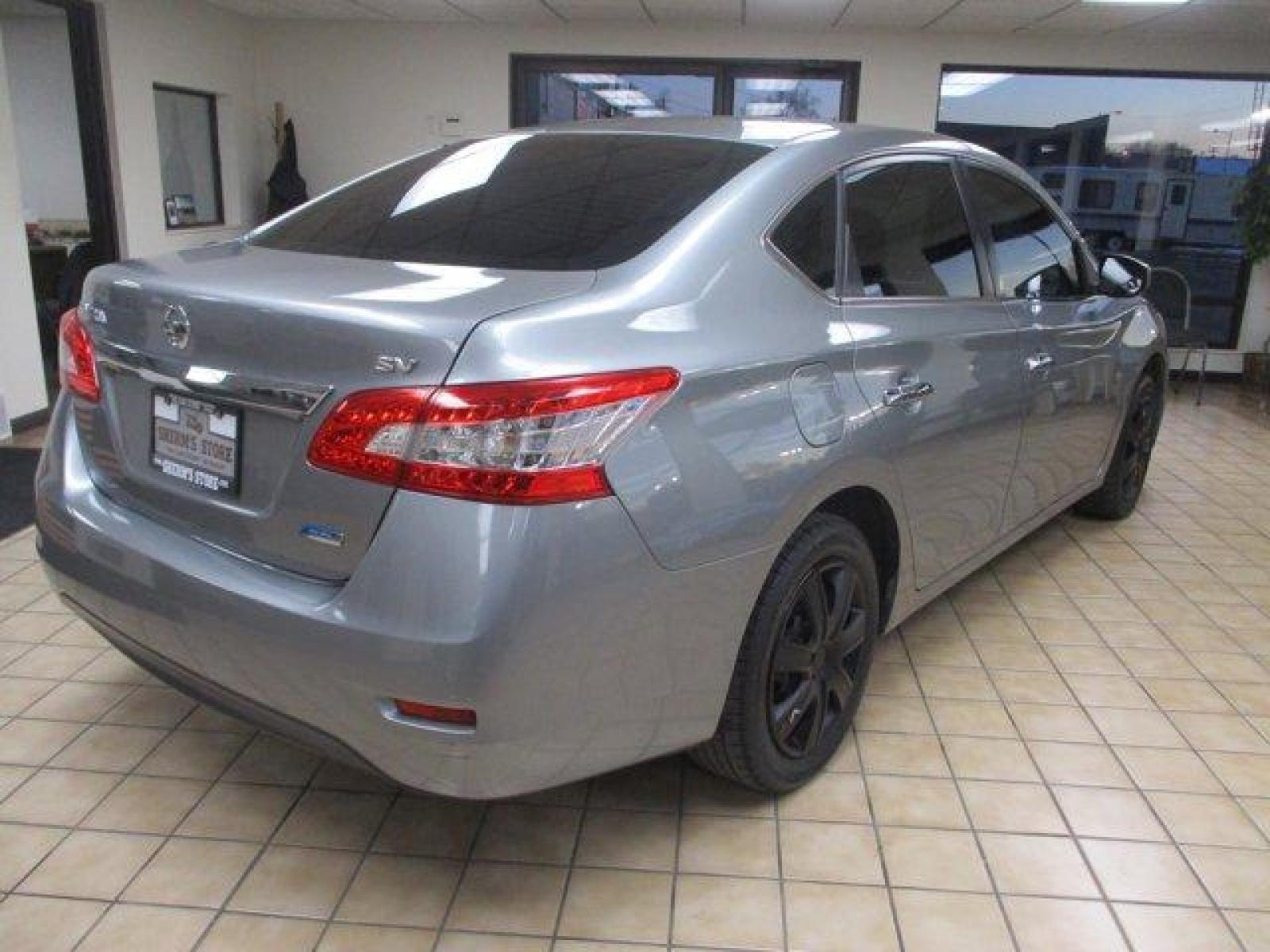 2014 Nissan Sentra (3N1AB7AP9EY) with an 4 1.8 L engine, Variable transmission, located at 3240 Washington Blvd., Ogden, 84401, (801) 621-7177, 41.204967, -111.969994 - *YOU FOUND IT !!! $7,988 LOOKIE AT THIS*Do you need a dependable car with good gas mileage for under TEN Grand and are having a hard time finding anything that's not wore right out? You might consider this good looking Nissan Sentra SV. 30 city and 38 highway mpg and only 107,635 miles.Sherm's Store - Photo #4