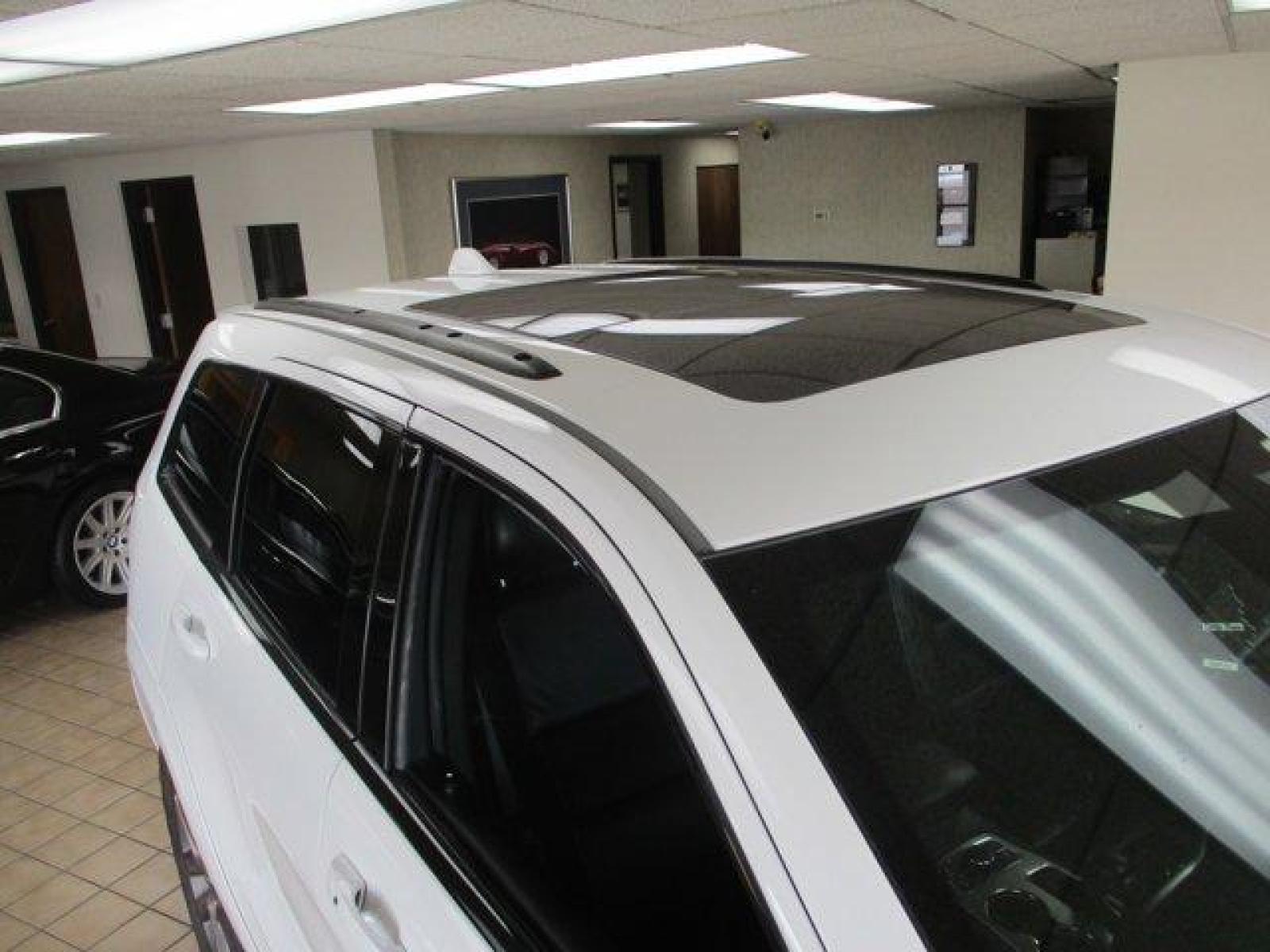 2018 Bright White Clearcoat /Black Jeep Grand Cherokee (1C4RJFCTXJC) with an 8 5.7 L engine, Automatic transmission, located at 3240 Washington Blvd., Ogden, 84401, (801) 621-7177, 41.204967, -111.969994 - Looking for a fully loaded Grand Cherokee with low mileage. Snap, this could be it. The High Altitude is Jeep's high end package and this one has it all. Full panoramic sunroof, huge back up camera, heated steering wheel and heated leather memory seats. Power passenger seat. Adaptive cruise control. - Photo #2